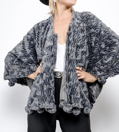 Wholesaler LINETA - H15-80 Poncho with zebra pattern pompom