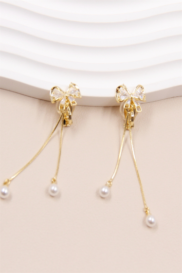 Wholesaler Bellissima - Bowknot crystal embellished clip-on earring