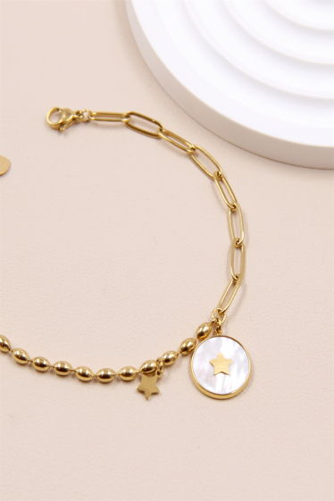 Wholesaler Bellissima - Asymmetrical pearly star bracelet in stainless steel.