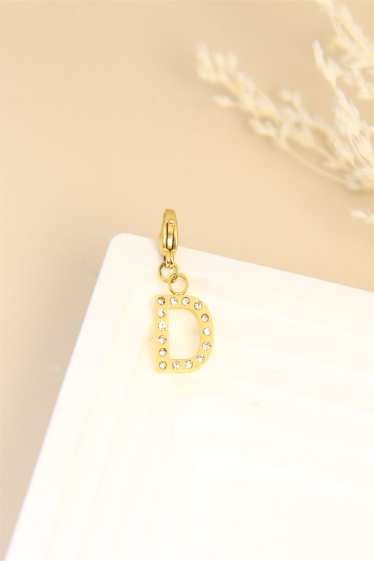 Wholesaler Bellissima - Charm's letter "D" pendant decorated with rhinestones in stainless steel