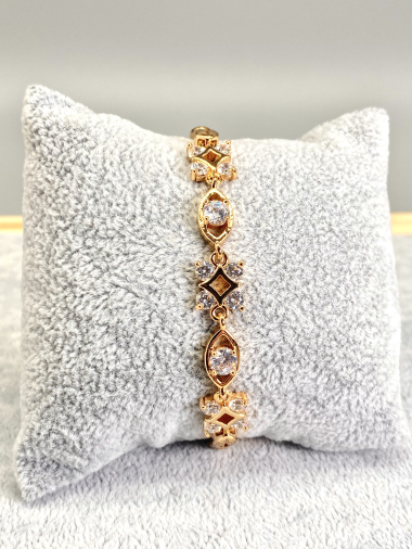 Wholesaler Cecile II - Golden copper bracelet with rhinestones
