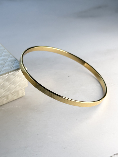 Grossiste Ceramik - Bracelet jonc fin en acier inoxydable semainier doré