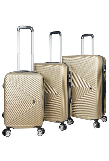 Mayoristas Chapon Maroquinerie - TRAVELER, set of 3 suitcases in champagne gold ABS.