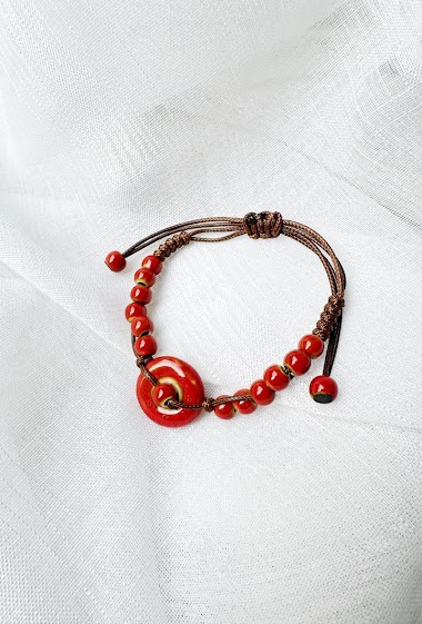 Cord bracelet with ceramic beads