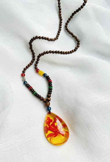 Long necklace, wood and amber color pendant
