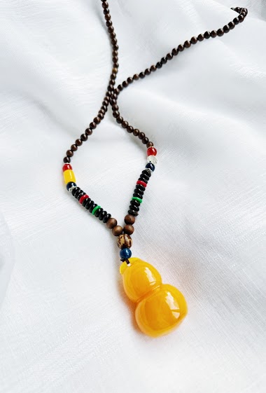 Mayorista D Bijoux - Long necklace, wood and amber color pendant