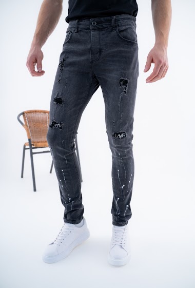 Großhändler Omnimen - Zerrissene und fleckige graue Jeans