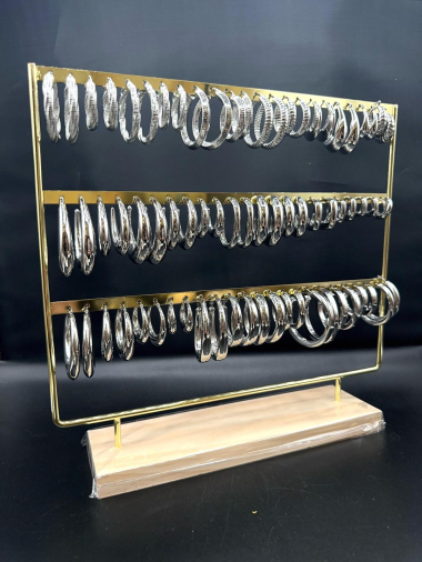 Wholesaler Emily - 37 steel hoop earrings on display