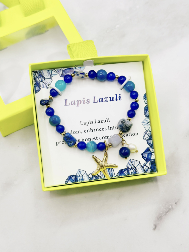 Grossiste Emily - Boite cadeau avec bracelet élastique de pierres LAPIZ LAZULI et acier inoxydable