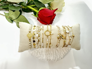 Wholesaler EMMASH BIJOUX - SET OF 12 BRACELETS DECORATED WITH CRYSTALS AND NATURAL STONES ON CUSHION