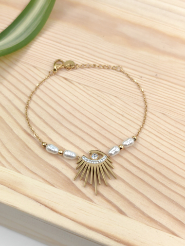 Grossiste Glam Chic - Bracelet perle avec oeil strass en acier inoxydable
