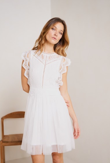 Sleeveless lace and frilly dress