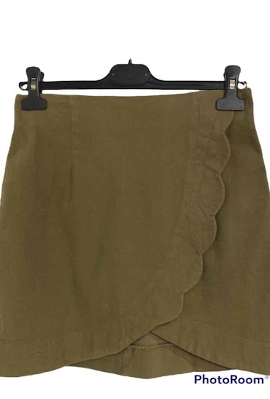 Denim skirt. scalloped finish on the draped effect side