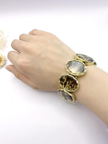 Grossiste H&T Bijoux - Bracelet acrylique léopard.