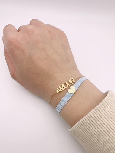 Grossiste H&T Bijoux - Set bracelet élastique et bracelet mot amour.