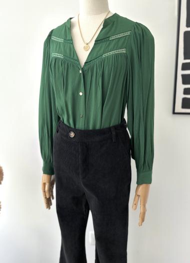 Wholesaler Inspiration Studio - Long sleeve v-neck blouse with lace detail.