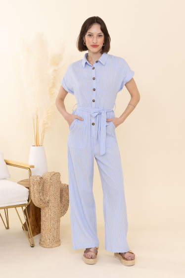 Wholesaler Inspiration Studio - Long striped jumpsuit with patch pocket at the front.