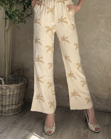 Wholesaler Inspiration Studio - Linen pants with embroidered Palm tree motif.