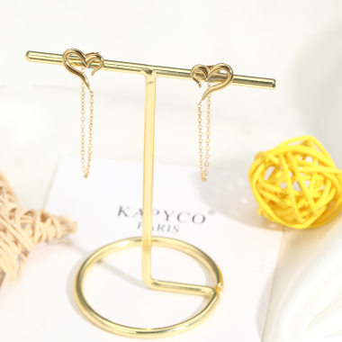 Grossiste Kapyco - Boucles d'oreilles coeur en acier avec chaînette liée avec l'embout