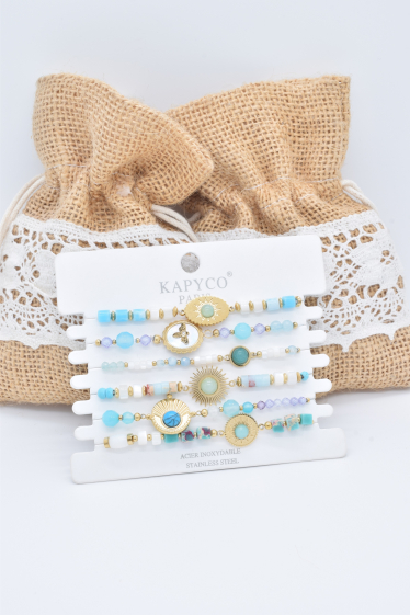 Wholesaler Kapyco - Set of 6 elastic bracelets in golden steel with stones and mother-of-pearl