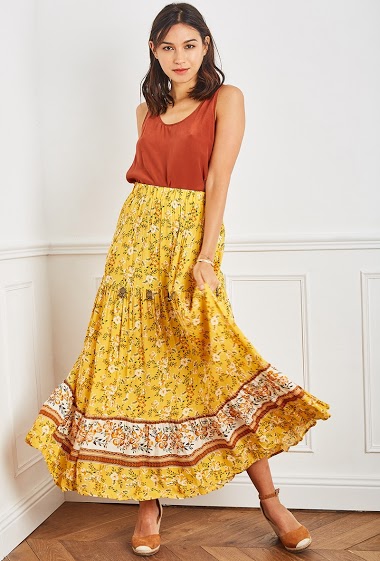 Long skirt embroidered with tight sequins with cord decorated with bells