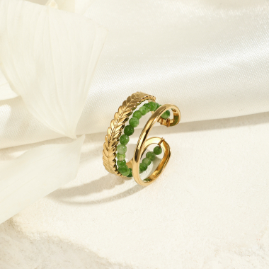 Großhändler Eclat Paris - Goldener Ring mit grünen Steinen