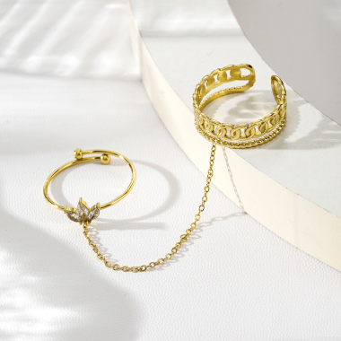 Mayorista Eclat Paris - Doble anillo dorado unido por una cadena.