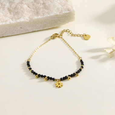 Grossiste Eclat Paris - Bracelet chaîne avec pierres noires et pendentif fleur
