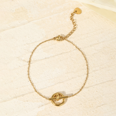 Grossiste Eclat Paris - Bracelet chaîne dorée avec pendentif rond et une barre