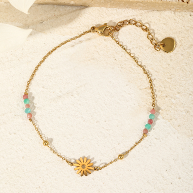 Grossiste Eclat Paris - Bracelet chaîne dorée avec pendentif soleil et pierre rose/bleu