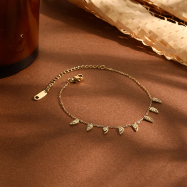 Grossiste Eclat Paris - Bracelet chaîne dorée mini pendentifs ailles