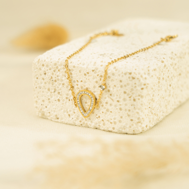 Grossiste Eclat Paris - Bracelet chaîne dorée pendentif en forme de goutte blanche