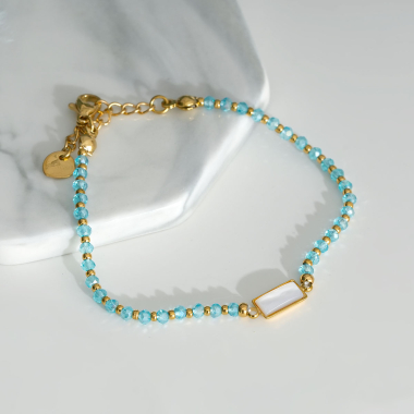 Großhändler Eclat Paris - Goldenes Armband mit blauem Stein