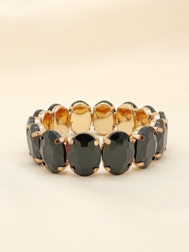 Wholesaler Eclat Paris - Gold elastic bracelet with black rhinestones
