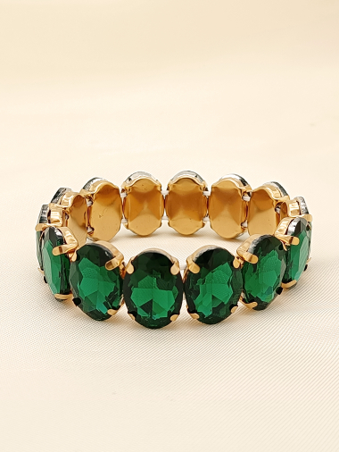 Großhändler Eclat Paris - Goldenes elastisches Armband mit grünen Strasssteinen