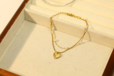 Grossiste Eclat Paris - Bracelet Double Chaîne Dorée avec Perles et Pendentif Cœur