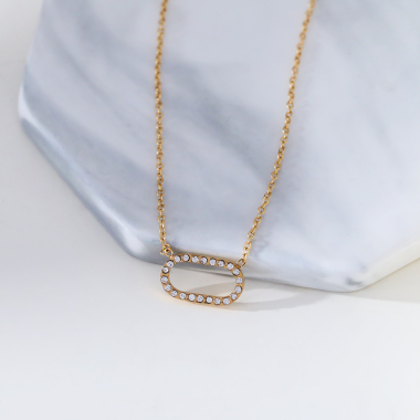 Grossiste Eclat Paris - Collier chaîne dorée avec pendentif en strass