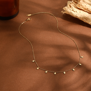 Grossiste Eclat Paris - Collier chaîne dorée mini pendentifs serpents