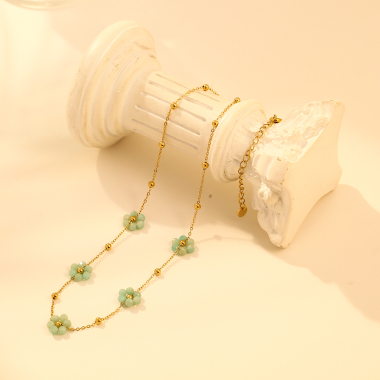 Wholesaler Eclat Paris - Golden necklace with 5 blue flowers in natural stones