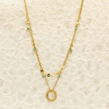 Grossiste Eclat Paris - Collier double chaîne dorée avec pendentif soleil et pierre verte