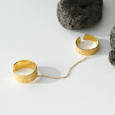 Wholesaler Eclat Paris - Double gold rings with star motifs connected by a chain