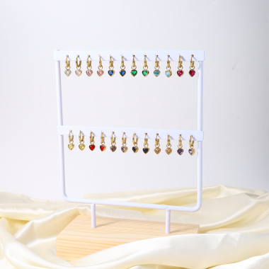Wholesaler Eclat Paris - Set of 12 pairs of hoop earrings with colorful heart pendants on display