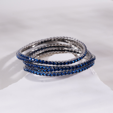 Großhändler Eclat Paris - Set aus 5 silbernen elastischen Armbändern mit blauen Strasssteinen