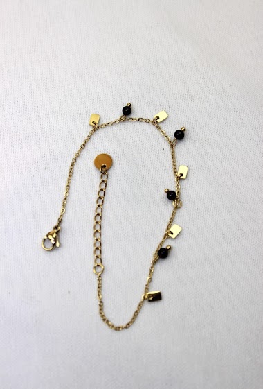 Grossiste MODELENE - Bracelet femme en acier titane - petites perles et pétales pendantes