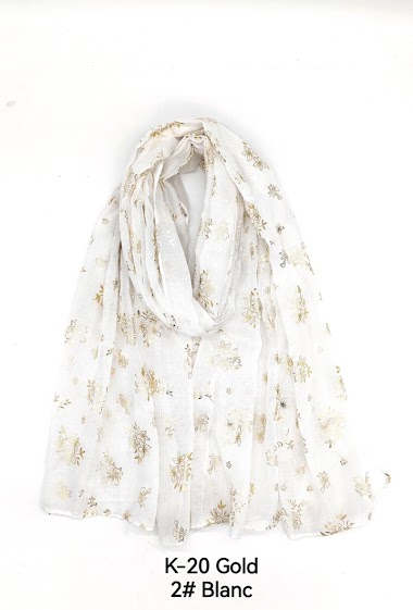 Shiny golden printed scarf with flower pattern