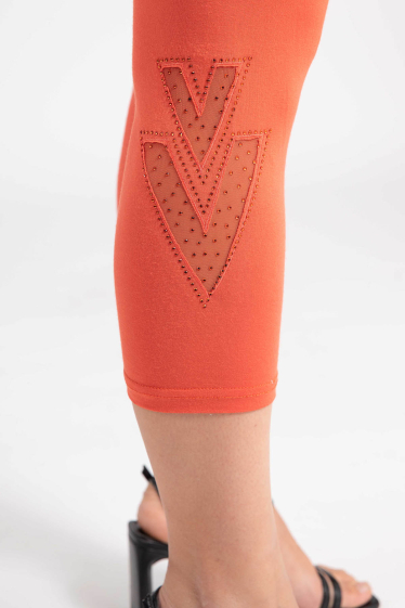 Großhändler Pomme Rouge Paris - Kurze Leggings mit orangefarbenem Muster (B228)