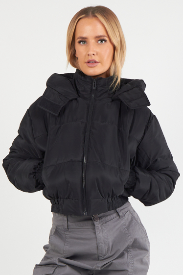 Wholesaler SK MODE - This long-sleeved, padded jacket for women with a high collar. SK1247