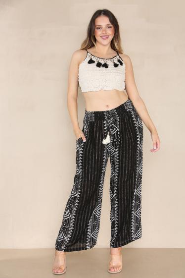 Ensemble femme ete 2023 Un pantalon court et un top a manches. SK