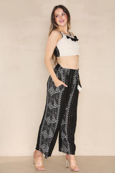 Ensemble femme ete 2023 Un pantalon court et un top a manches. SK