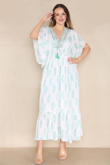 Wholesaler SK MODE - Plain and simple long dress with short sleeves and floral print..